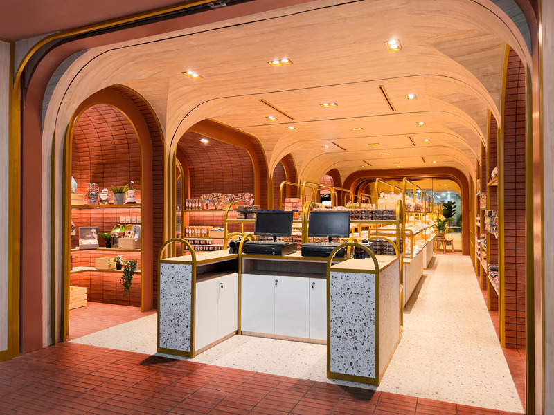 Dossier de presse | 7653-01 - Communiqué de presse | A National Class Bakery Originating From Papua - Upper Room Collaborative Studio - Design d’intérieur commercial - Cashier and Exit from Front Facade View 1 - Crédit photo : Upper Room Collaborative Studio