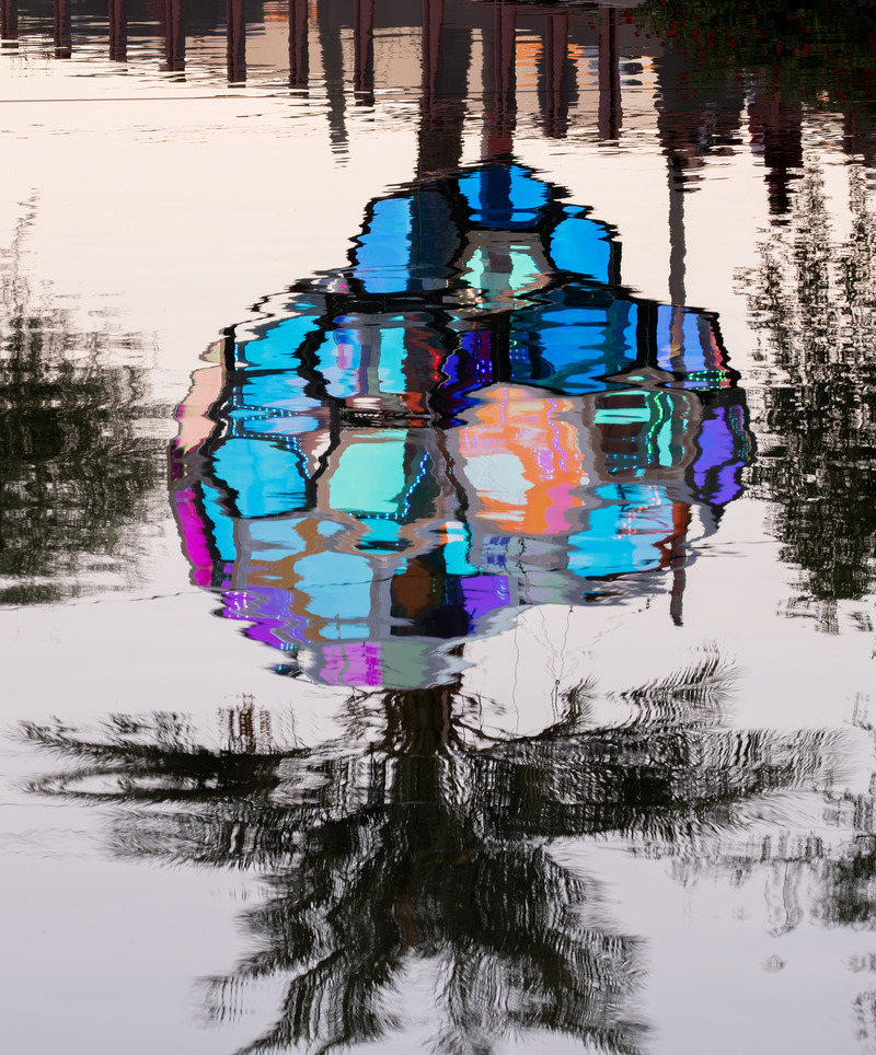 Press kit | 5595-10 - Press release | Molecules: A Series of Interactive Water Molecules Rising up from the Arizona Canal, Sparking a Connection Between Visitors and the Surrounding Environment Through Light and Sound - The Urban Conga - Multimedia Design - Reflections of molecules onto the water.  - Photo credit: Charles Darr