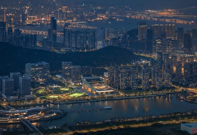 Press kit | 5204-03 - Press release | Hengqin Culture & Art Complex: A Beacon of Growth and a Bastion of Arts and Culture - Yunchao Xu/Atelier Apeiron - Commercial Architecture -  Night view from the mountain towards Macau  - Photo credit:   Yipeng Lv  