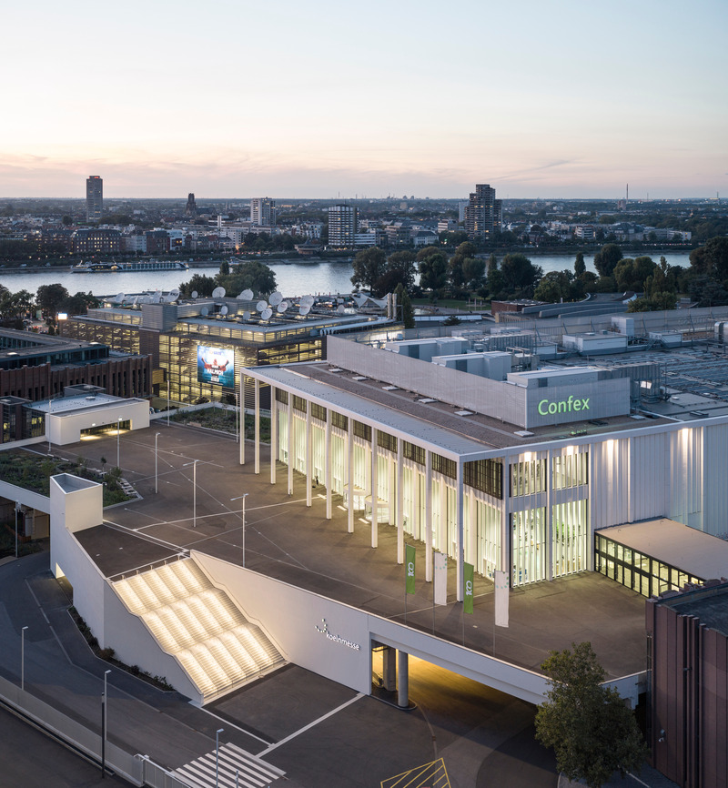 Press kit | 6515-02 - Press release | Confex, Koelnmesse, Cologne Trade Fair - JSWD - Event + Exhibition -  Confex Plaza and main entrance<br>  - Photo credit: HG Esch