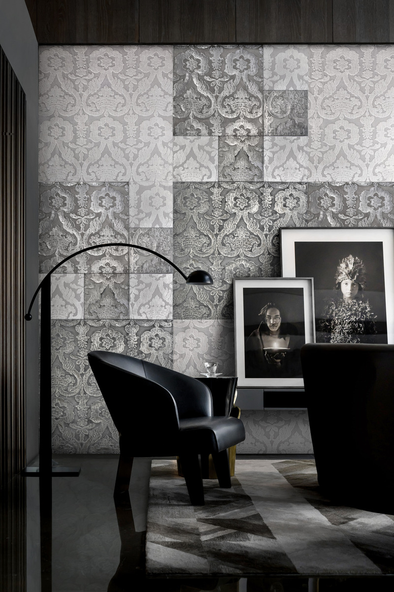 Press kit | 4232-28 - Press release | Superfici Venice Collection by Materica - Materica - Product -  <p class=""><b>LEVANTINA</b></p><p style=""><b>Tiziano Guardini e Luigi Ciuffreda</b> with <b>Tessitura Luigi Bevilacqua</b></p><p style=""><br></p><p class="">Tracing the myriad threads connecting East and West, Levantina takes shape. Tiziano Guardini and Luigi Ciuffreda draw from the rich legacy of the historic Tessitura Luigi Bevilacqua to create a three-dimensional mosaic of Venetian silk velvets. This architectural masterpiece within architecture features dynamic volumes. Panels juxtapose natural fabrics with finely metalized textiles, offering a striking contrast between opacity and sheen that lends extraordinary sensory depth to the surfaces.</p>Levantina transforms centuries of tradition into contemporary luxury. The boiserie uses Velluto Senatori in two shades—Bianco Gardenia and Rosso Ibisco. The arabesque patterns of the fabric echo the decorations of a significant 17th-century Venetian garment: the togas of the Serenissima’s senators, as depicted in paintings by Tiepolo and Domenico Tintoretto. Metalized fabric modules are available in zinc, brass, copper, and pewter with a polished finish.<span></span><span></span><br><br>  - Photo credit:  Courtesy of Materica 