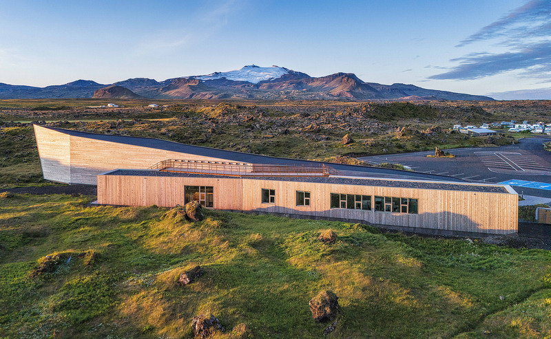 Press kit | 6422-01 - Press release | Visitor Center for Snæfellsjökull National Park - Arkis Architects - Commercial Architecture - Visitor center with Snæfellsjökull in the background - Photo credit: Karl Vilhjálmsson