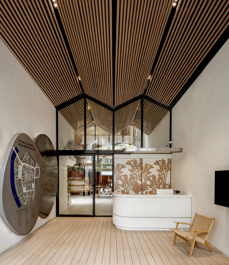 Press kit | 7671-01 - Press release | Double B Hostel — Local Craft, Global Design — Bangkok's New Hostel Icon - VMA Design Studio - Commercial Architecture - Reception Lobby - Photo credit: Peerapat Wimolrungkarat