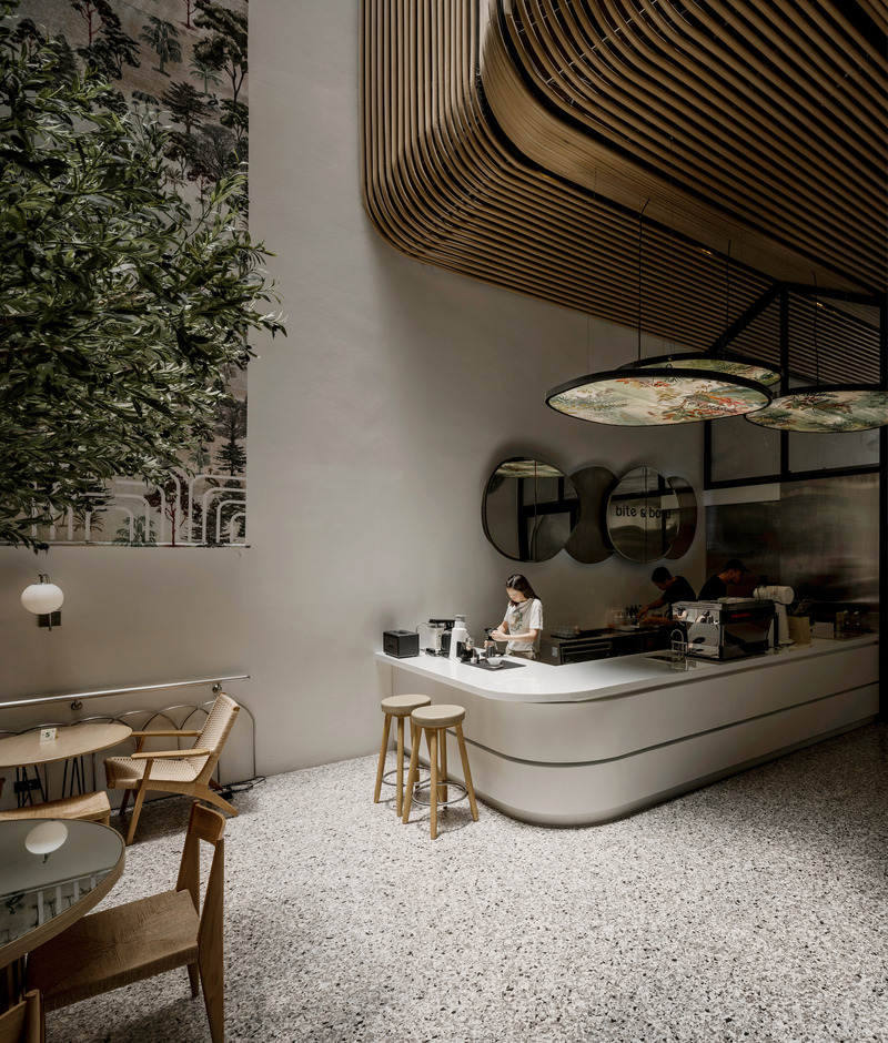Press kit | 7671-01 - Press release | Double B Hostel — Local Craft, Global Design — Bangkok's New Hostel Icon - VMA Design Studio - Commercial Architecture -  Daylight reaches the cafe below - Photo credit: Peerapat Wimolrungkarat