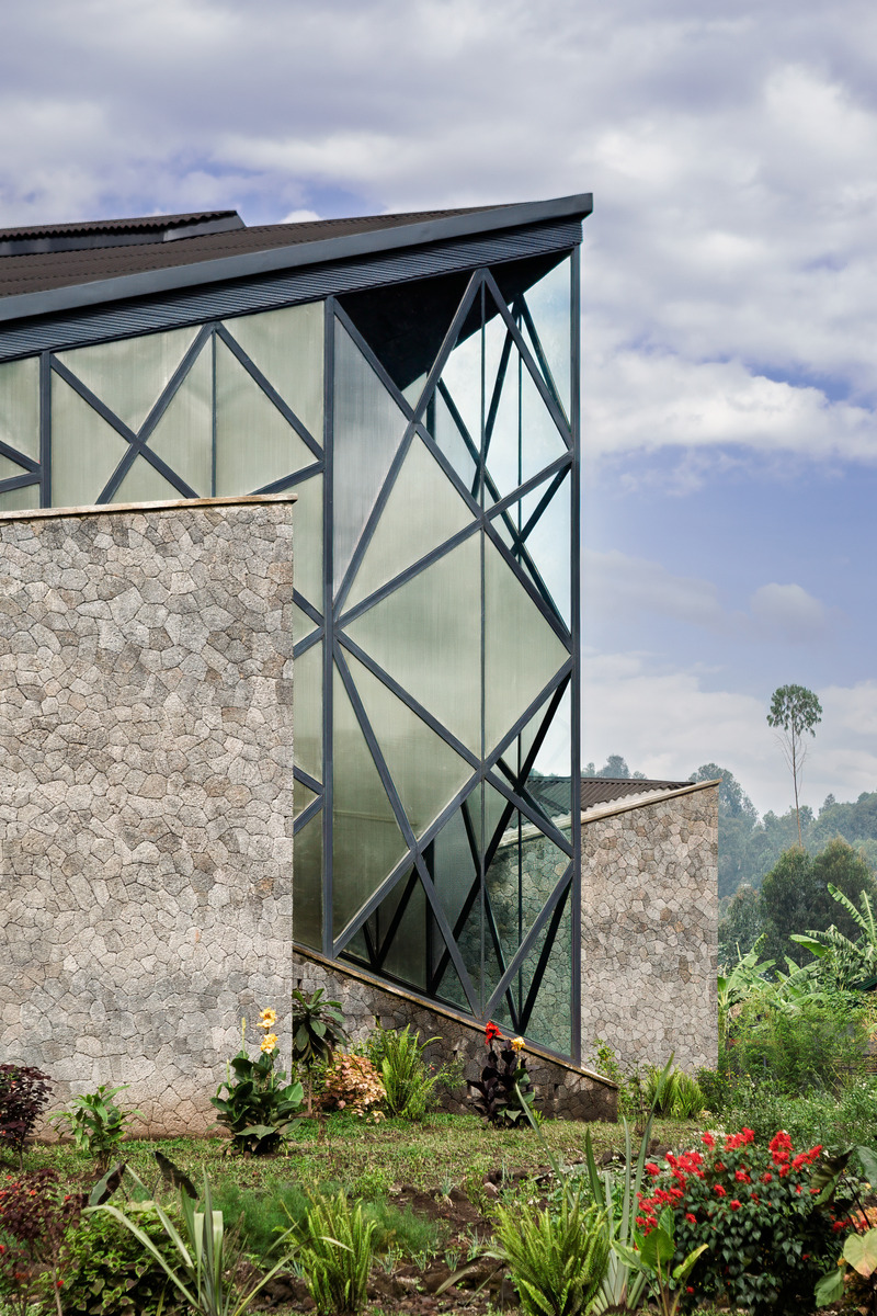 Press kit | 7043-02 - Press release | BE_Design - Virunga Mountain Spirits - BE_Design - Commercial Architecture - Luminous distillery core wrapped in volcanic rock  - Photo credit: Bruce Engel