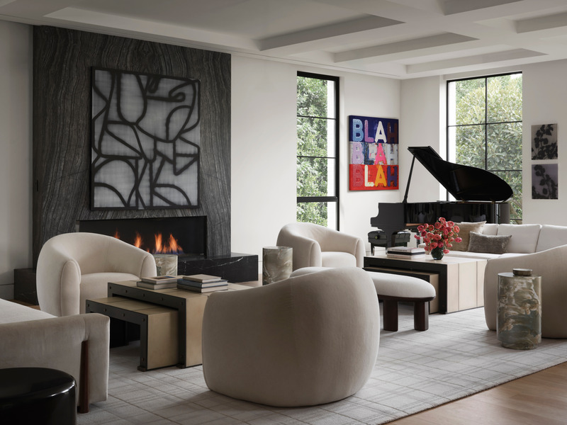 Press kit | 6087-05 - Press release | Palm Residence: A Harmonious Fusion of Hospitality and Home - Daniel Joseph Chenin - Residential Interior Design - Acrylic on canvas by Jeff Peters visually anchors the stone clad fireplace which serves as a backdrop to the expansive seating grouping atop an oversized Scott Group area rug. - Photo credit: Douglas Friedman