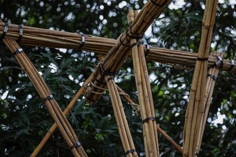Press kit | 7035-02 - Press release | Bamboo Housing Resists 7.7 Earthquake in Conflict-Torn Myanmar, Built for Displaced Families - Blue Temple - Institutional Architecture - Close-up of bamboo bundle jointing, showing steel straps and geometric interlocking. - Photo credit: Aung Htay Hlaing
