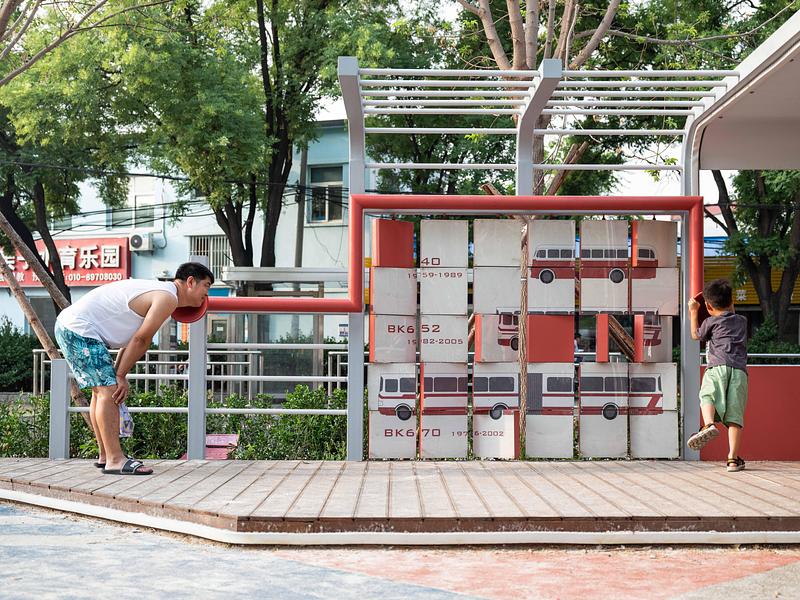 Press kit | 7020-04 - Press release | Old Beijing Bus: The Public Children's Space with a Bus Theme on the Streets of Changping - XISUI Design - Landscape Architecture - Voice tube and flip wall - Photo credit:  Hu Yihao 