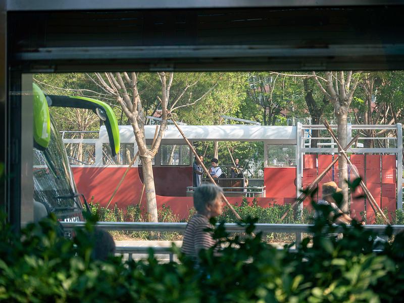 Press kit | 7020-04 - Press release | Old Beijing Bus: The Public Children's Space with a Bus Theme on the Streets of Changping - XISUI Design - Landscape Architecture - Past and present bus stops facing each other across the street 1<br> - Photo credit:  Hu Yihao 