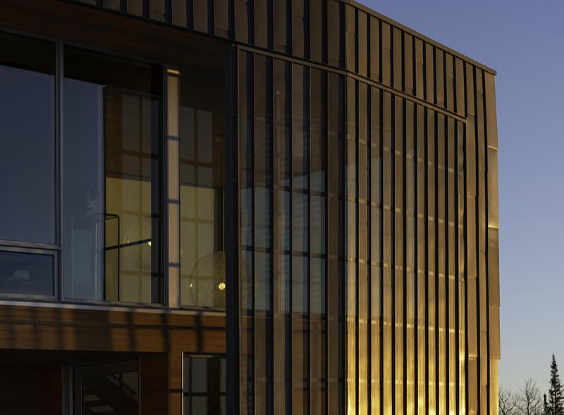 Press kit | 2757-60 - Press release | A Carefully-Crafted Winter Retreat by Sparano + Mooney Architecture Is Inspired by the Japanese Art of Kirigami - Sparano + Mooney Architecture - Residential Architecture -  The highly corrosion-resistant steel-zinc composite is perfect for the elements. One section is perforated, with standing-seam panels, while some are opaque.  - Photo credit:  Matt Winquist 