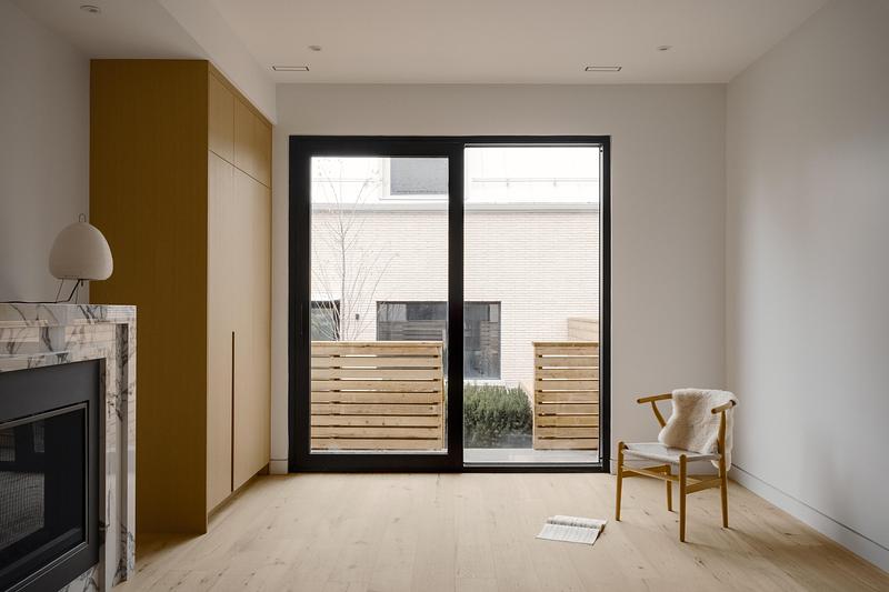 Press kit | 7856-01 - Press release | Montrose Sixplex: A New Housing Model for Gentle Density on a Residential Street in Toronto - Gabriel Fain Architects - Residential Architecture - Interior fireplace of Unit 2 - Photo credit: Félix Michaud