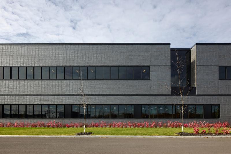 Press kit | 1440-05 - Press release | NFOE and Archi– Design Monolithic Laboratory in Quebec - NFOE  | Archi– - Institutional Architecture - East facade - Photo credit: James Brittain