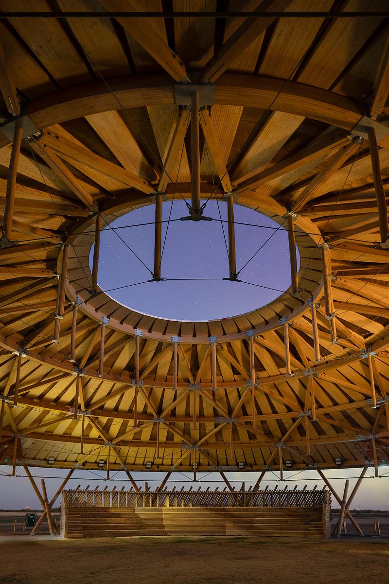 Press kit | 7916-01 - Press release | Rooted in Culture: The Muscowpetung Powwow Arbour Wins Architizer A+ Award and Canada's Governor General’s Medal in Architecture - Oxbow Architecture & Richard Kroeker - Institutional Architecture - <p class="">Interior image of Arbour at twilight with stars seen through the oculus</p> - Photo credit: Lindsay Reid<span></span>
