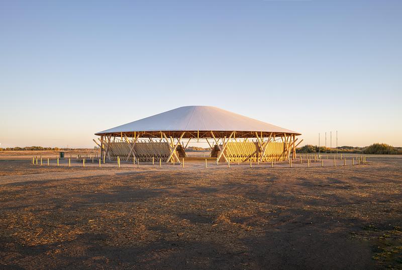 Press kit | 7916-01 - Press release | Rooted in Culture: The Muscowpetung Powwow Arbour Wins Architizer A+ Award and Canada's Governor General’s Medal in Architecture - Oxbow Architecture & Richard Kroeker - Institutional Architecture - <p class="">Exterior image of Arbour at daybreak looking directly north through structure’s</p><p class="">secondary entry</p> - Photo credit: Lindsay Reid<span></span>