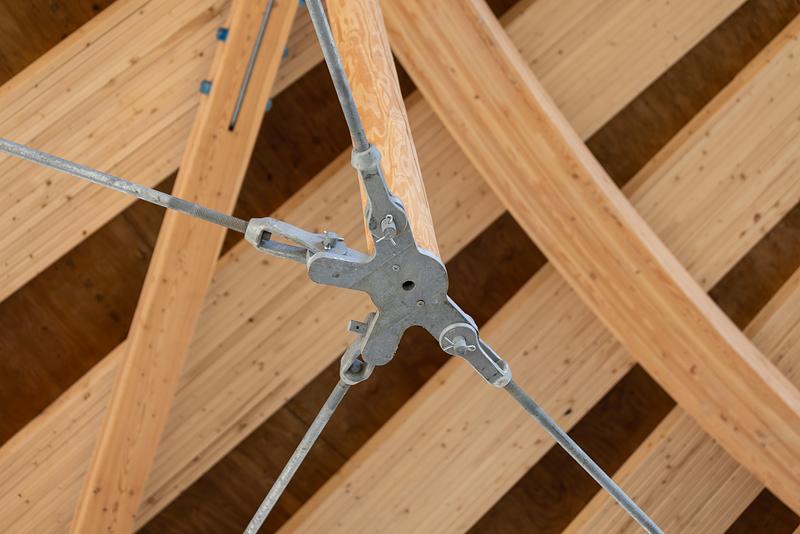 Press kit | 7916-01 - Press release | Rooted in Culture: The Muscowpetung Powwow Arbour Wins Architizer A+ Award and Canada's Governor General’s Medal in Architecture - Oxbow Architecture & Richard Kroeker - Institutional Architecture - <p class="">Interior image of Arbour showing structural round timber strut and cable system</p><p class="">connection</p> - Photo credit: Lindsay Reid<span></span>