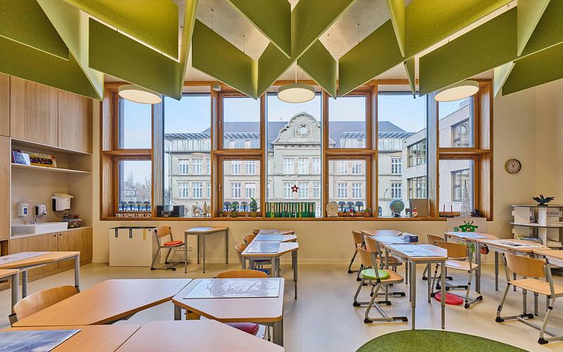 Press kit | 6515-05 - Press release | Ecole Brouch: Primary School - JSWD + Jim Clemes Ass. - Institutional Architecture -  Classroom with a view of the old school building  - Photo credit: Andres Lejona
