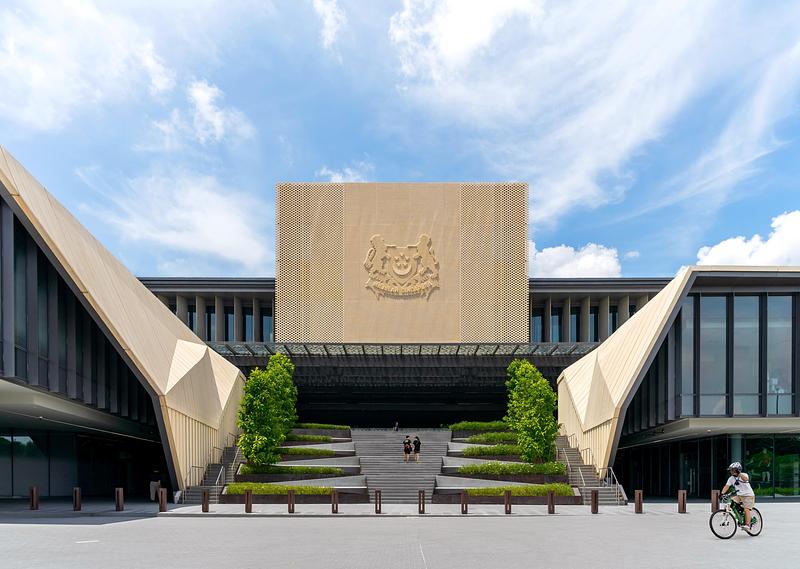 Dossier de presse | 4036-02 - Communiqué de presse | DP Architects’ Central Manpower Base (CMPB) Wins at Architizer A+ Awards 2026 - DP Architects - Architecture institutionnelle - The central staircase forms a ceremonial civic axis, framed by the Beacon façade — a porous concrete screen that transforms solidity into light and identity. - Crédit photo : Melcas Lim, Courtesy of DP Architects