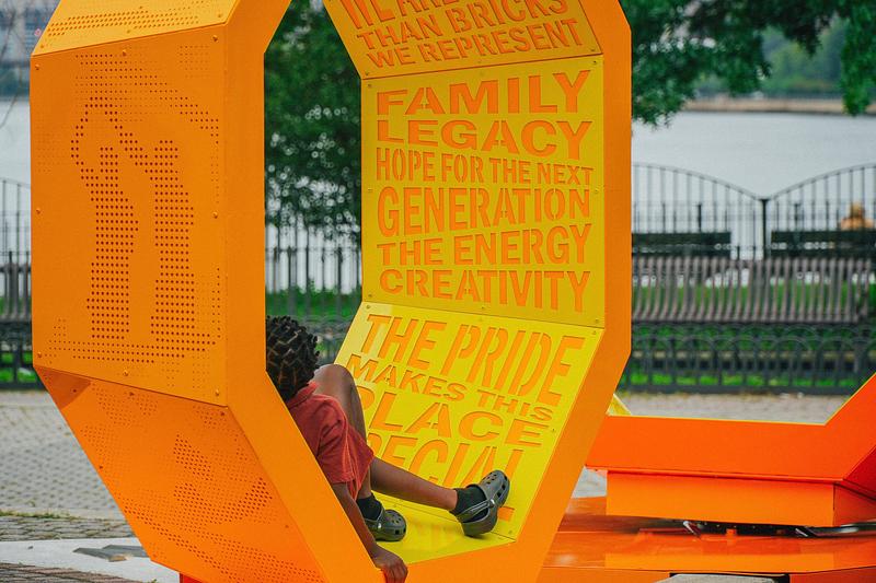 Press kit | 5595-13 - Press release | The Urban Conga Unveils “Revolving Voices” at New York Public Housing in Collaboration with Local Poet Tamra Cosby - The Urban Conga - Art - <p>A young resident sits inside the structures for moments of quiet reflection while encountering the stories and memories of their neighbors. </p> - Photo credit: Tameek Williams