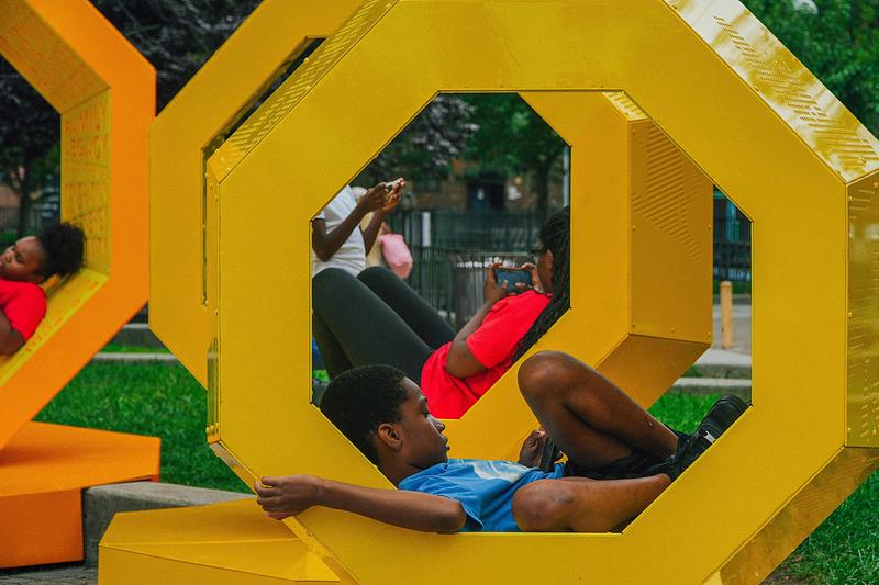 Press kit | 5595-13 - Press release | The Urban Conga Unveils “Revolving Voices” at New York Public Housing in Collaboration with Local Poet Tamra Cosby - The Urban Conga - Art - <p>The structures create a playable landscape that encourages people to climb, explore, lounge, and gather.</p> - Photo credit: Tameek Williams