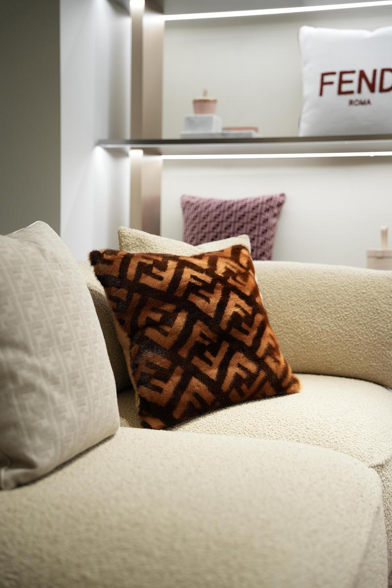 Press kit | 7656-03 - Press release | This Winter, the Most Desirable Fendi Isn't Worn - Maison Territo - Commercial Interior Design - Fendi Casa FF monogram cushions and “FENDI Roma” embroidered cushion. Available at the Maison Territo showroom, Royalmount, Montreal · maisonterrito.ca - Photo credit: Sinclair Territo