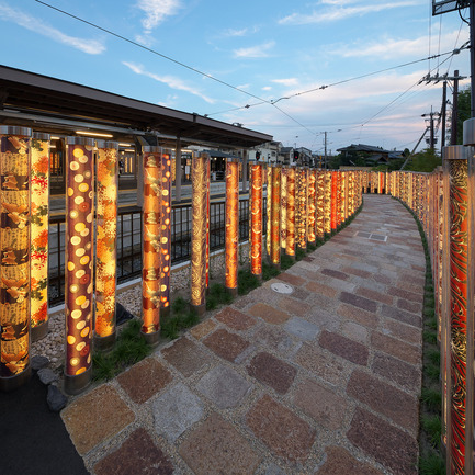 Press kit | 902-02 - Press release | A’ Design Awards 2014 Winners Announced - A' Design Award and Competition - Competition - Randen Arashiyama Station <br>Railway station by GLAMOROUS co.,ltd.<br><br>PROJECT DESCRIPTION:<br>Kyoto Arashiyama is named after arashi (storm) from Mt. Atago which beautifully blows cherry blossoms and maple leaves. Randen Arashiyama Station is located in central of Arashiyama and in opposite of Tenryuji-temple which is registered on the World Heritage List. We have made a soft, cozy and elegant lighting forest in such a special station with approx. 600 poles rapped with Kyoto Yuzen kimono fabrics. This lighting forest is a part of hospitality for both locals and visitors so that they will feel excited with special time’s start from the station.&nbsp;<br> - Photo credit: SEIRYO YAMADA, Randen Arashiyama Station, 2013.&nbsp;