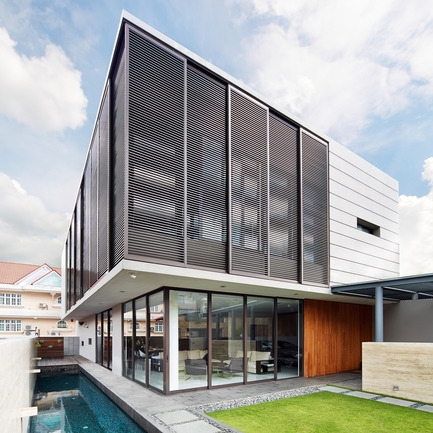Press kit | 902-02 - Press release | A’ Design Awards 2014 Winners Announced - A' Design Award and Competition - Competition - Screen House <br>Eco Residential by Renaissance Planners &amp; Designers<br><br>PROJECT DESCRIPTION:<br>The existing house was dark and poor cross ventilation. Therefore we propose a new concept to have large windows, but at the same time filtering the heat from the sun. The stairs acts as an airwell with a skylight and ventilation vents.Thus improving the air circulation in the house keeping it constantly cool. The screen on the external facade not only acts as shade from the sun but also giving privacy for the user as the neighbouring houses are built closely to each other.<br> - Photo credit:  Renaissance Planners &amp; Designers, 2013. 