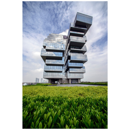 Press kit | 902-02 - Press release | A’ Design Awards 2014 Winners Announced - A' Design Award and Competition - Competition - Nanfung Complex <br>Commercial, Hospitality and Exhibition by Andrew Bromberg of Aedas<br><br>PROJECT DESCRIPTION:<br>Located on the Pazhou island dedicated to exhibition related activities, the Nanfung Commercial, Hospitality and Exhibition Complex contains four distinct programmatic uses on two sites which are separated 160 meters from each other by another building. The unified structure of a vertical podium with a multi-storey horizontal blocks establishes and promotes a dialogue between the two buildings, leaping over the middle neighbour and creating a strong, unified architectural identity for the project.<br> - Photo credit: Andrew Bromberg of Aedas