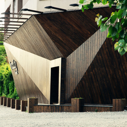 Press kit | 902-02 - Press release | A’ Design Awards 2014 Winners Announced - A' Design Award and Competition - Competition - Family center <br>Store by Ali Alavi<br><br>PROJECT DESCRIPTION:<br>There are a few reasons why I enclosed the long (30 meters) front wall. One, was that the existing building's elevation was really unpleasant, and I had no permission to touch it! Secondly, by enclosing the front facade, I gained 30 meters of wall space inside. According to my daily observational statistics study, majority of shoppers chose to go inside the store just because of curiosity, and to see what's happening behind this facade Curious forms.<br> - Photo credit: Ali Alavi,2013