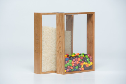 Press kit | 884-04 - Press release | HEC Project 2014 Edition - Faculté d'aménagement de l'Université de Montréal - Industrial Design -  The Rizcipient<br><br>The  Rizcipient has been designed to highlight your food in the kitchen.  Thus, the transparency is exploited briliantly in contrast with the  cherry wood frame. The sliding opening makes it easy to use and possible  for an ajustable flow.<br><br><br>Étienne Lemieux<br>Émilie Proulx<br>Isabelle Vo<br><br>Facebook page: https://www.facebook.com/lerizcipient  - Photo credit: Olivier Ouimet 2014 - www.olivierouimet.com