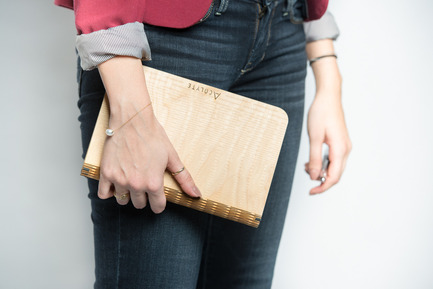Press kit | 884-04 - Press release | HEC Project 2014 Edition - Faculté d'aménagement de l'Université de Montréal - Industrial Design - Acolyte<br><br>The acolyte is a sketchbook made out of Russian birch plywood which was laser cut and within which one can easily switch-out the sheets (8 ½ x 11) due to the elastic holding them in place. It is the perfect accomplice to your creativity.<br><br>Tara Harb<br>Maxim Lamirande<br>Gaëtan Nkamegue<br> - Photo credit: Olivier Ouimet 2014 - www.olivierouimet.com
