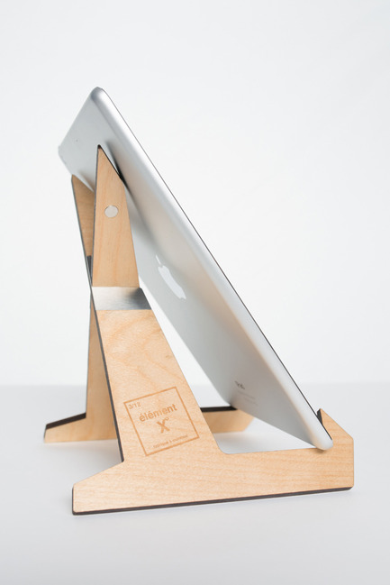 Press kit | 884-04 - Press release | HEC Project 2014 Edition - Faculté d'aménagement de l'Université de Montréal - Industrial Design -  Élément X<br><br>Two  Russian birch plywood L shapes embed themselves to form a book or  tablet stand. Two widths are possible depending on the direction of  embedding and portability is made easy by the presence of magnets. <br><br>[Recipient of the prize of the product towards a commercialization.]<br><br>Charles-Philippe Lepage<br>Thomas Ho<br>Olivier Ouimet<br> - Photo credit: Olivier Ouimet 2014 - www.olivierouimet.com