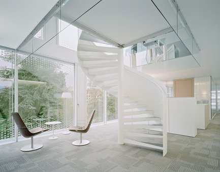 Dossier de presse | 2237-01 - Communiqué de presse | World Trade Organization - wittfoht architekten - Architecture institutionnelle - spiral stairs promote internal communication - Crédit photo : brigida gonzález<br>