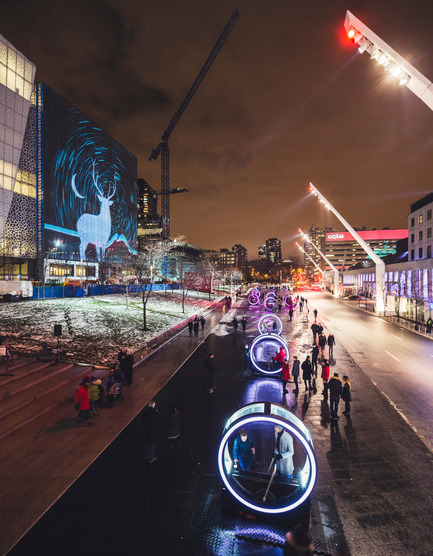 Press kit | 583-17 - Press release | Luminothérapie:Loop’s Giant Illuminated Wheels Take Over the Place des Festivals - Quartier des spectacles Partnership - Event + Exhibition - Loop, a creation by Olivier Girouard and Jonathan Villeneuve in collaboration with Ottoblix.&nbsp; - Photo credit: Ulysse Lemerise/OSA Images