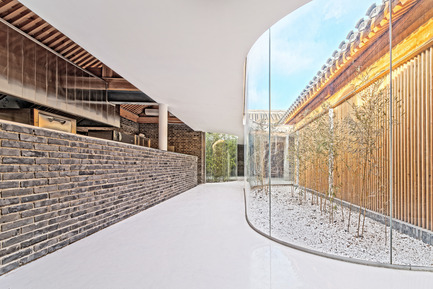 Press kit | 2264-01 - Press release | Tea House in Hutong - Arch Studio - Commercial Interior Design - Kitchen and Glass Curvy Corridor - Photo credit: Wang Ning