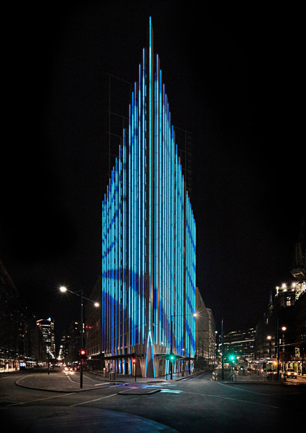 Dossier de presse | 1124-13 - Communiqué de presse | World Interiors News Awards Ceremony 2016 - World Interiors News - Design d’intérieur commercial - JOINT WINNER: LIGHTING PROJECTS<br>888 Collins Street by Ramus<br><br>888 Collins is a prestigious residential development occupying the wedge where Bourke and Collins Street meet in Melbourne. The façade is flanked by soaring vertical fins, which form the focus of Ramus’ lighting design.<br>The client brief was to articulate the architecture with light and, through that, to develop an artistic approach to the lighting design that could meet the City of Melbourne’s Public Art guidelines. <br><br>In response to this we emphasized the rhythm and height created by fins on the façade by fitting each fin with custom LED fixtures. <br><br>JUDGES’ COMMENTS<br>‘It’s not just another media façade; the control system that allows weather to &nbsp;determine the intensity and colour of the lights appealed to all the jury.’   - Crédit photo : Ramus