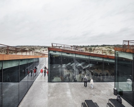Press kit | 1997-04 - Press release | TIRPITZ, a 'Hidden Museum' on Danish West Coast - BIG - Bjarke Ingels Group and Tinker imagineers - Event + Exhibition - The central courtyard allows access into the four underground gallery spaces that have an abundance of daylight even though they are literally carved into the sand. - Photo credit: Rasmus Hjortshoj