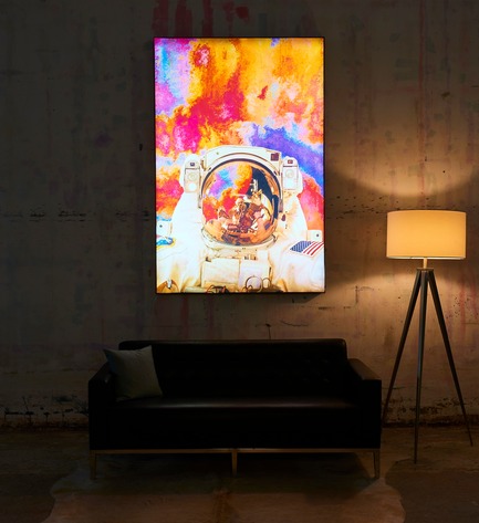 Press kit | 2796-01 - Press release | Big Naked Wall Creates New Art Category with Backlit Frames - Big Naked Wall - Art - Simply titled "Astronaut in Space" by Zouassi. This is another backlit art piece that showcases the deep impact that the backlighting provides on its environment.&nbsp; - Photo credit: Big Naked Wall