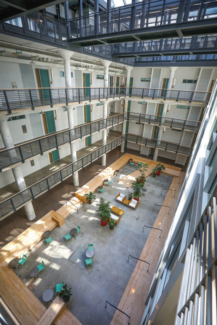 Press kit | 2073-11 - Press release | Sears Department Store that Sat Derelict for Decades Is Reborn as Mixed-Use 'Vertical Village' - DIALOG - Commercial Architecture - Parcel Residences at Crosstown Concourse - Photo credit: Jamie Harmon