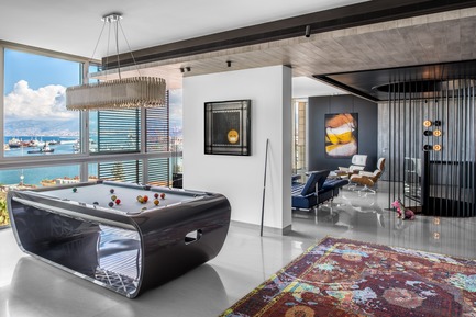 Dossier de presse | 2769-02 - Communiqué de presse | One Oak 3&4 B2 - Askdeco - Design d’intérieur résidentiel - - Billiard table&nbsp;Toulet Brand - "Blacklight: - Black lacquered wood with metalic effect<br>-Lighting suspension on top of billiard -&nbsp;Delightfull Matheny snooker suspension - Brass nickel color finish<br>-Artwork "Sick " Shemagh Collection - Designed by Hawini Lebanese Artist&nbsp;<br>-Carpet:&nbsp;Jan Kath - Erased Heritage<br>-Dog Statue by Julien Morinetti<br>-Lighting behind the stairs bars :&nbsp;PSLAB - Lebanese Lighting design company<br>-White lounge chairs -&nbsp;Vitra Eames&nbsp;<br>-Artwork next to Vitra chair - by Etienne Gros<br><br> - Crédit photo : Alex Jeffries&nbsp;
