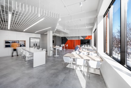 Press kit | 3143-01 - Press release | A Design in Tune with TV5’s Vision - FOR. design planning - Commercial Interior Design - The most spectacular view of the office is given to all employees, thanks to the cafeteria's location right by the large windows, on the south side with direct view on the St. Lawrence River.<br> - Photo credit: David Boyer