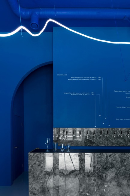 Press kit | 2247-04 - Press release | Galaxy Bar and Bottle Shop - Maxim Kashin Architects - Commercial Interior Design -  Neon flex light installation with grey marble counter and 'himmelblau' blue walls  - Photo credit:  Dmitry&nbsp;Chebanenkov 