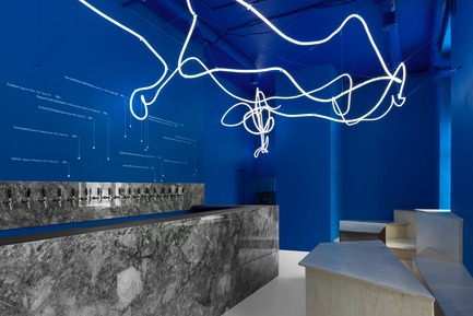 Press kit | 2247-04 - Press release | Galaxy Bar and Bottle Shop - Maxim Kashin Architects - Commercial Interior Design -  Neon flex light installation with grey marble, plywood custom furniture and 'himmelblau' blue walls  - Photo credit: Dmitry&nbsp;Chebanenkov