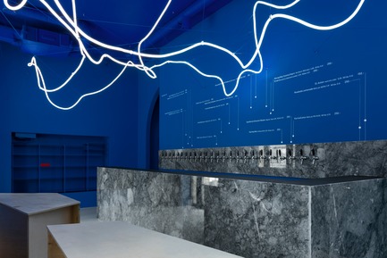 Press kit | 2247-04 - Press release | Galaxy Bar and Bottle Shop - Maxim Kashin Architects - Commercial Interior Design -  Neon flex light installation with grey marble, plywood custom furniture and 'himmelblau' blue walls  - Photo credit:  Dmitry&nbsp;Chebanenkov 