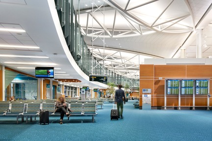 Press kit | 2124-02 - Press release | IESBC Announces its 2018 ‘Vision Awards’ for Best Lighting Design in BC, Canada - IESBC - Lighting Design -         Vancouver International Airport A-B Connector&nbsp; - Recessed T5 slotlights in lower ceiling and recessed directional LED downlights at high ceiling lluminates the holdrooms. Concealed linear LED strips uplight the upper structures. - Photo credit:         Ed White Photography