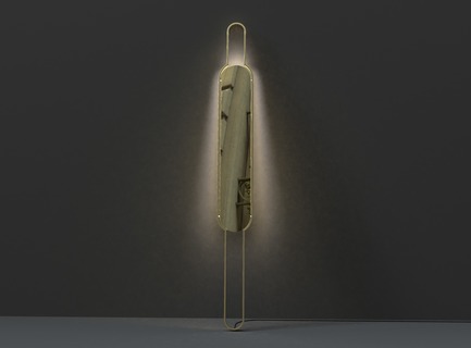 Press kit | 1895-04 - Press release | L A M P Finalists Announced for Fifth Annual International Lighting Design Competition - L A M P (Lighting Architecture Movement Project) - Lighting Design -  Portal by Mark Kinsley from Chicago, IL, USA. Precariously balancing two surfaces, wall and floor, Portal is neither sconce or floor lamp, and yet it is also curiously both. The elongated form and reflective, polished brass core nod to the mirror as a literary object of magic, a portal to other worlds. Like our own world, Portal finds stasis in polarity. Favoring neither pole, Portal has no upside down as form balances function for lighting both up and down.  - Photo credit:  L A M P 