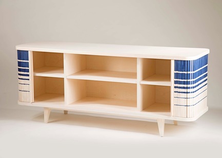 Dossier de presse | 2704-04 - Communiqué de presse | Pure Talents Contest 2019: 26 Forward-Looking Product Ideas at imm cologne and LivingKitchen - imm cologne 2019, Koelnmesse GmbH - Design d’intérieur résidentiel -  At your service: the low tambour credenza by INDO- (Manan Narang and Urvi Sharma) is a highly original alternative to conventional sideboards. This new interpretation of a popular 19th-century furniture item was inspired by the Ikat weaving technique, in which each warp end is dyed individually or in bundles – a principle the designers transferred to the individual wooden slats of the sliding doors.  - Crédit photo :  INDO-; Koelnmesse 