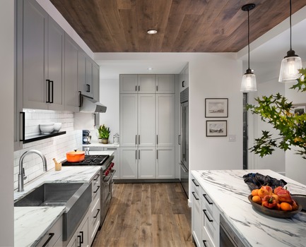 Press kit | 2875-06 - Press release | Park Slope Duplex Apartment - Barker Architecture Office - Residential Interior Design -  Semicustom kitchen cabinets and statuarietto marble countertops with custom blackened steel shelf. Custom finish flooring also surfaces ceiling. - Photo credit: Amy Barkow