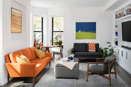 Press kit | 2875-06 - Press release | Park Slope Duplex Apartment - Barker Architecture Office - Residential Interior Design -  Living room with furniture from room and board and custom millwork. - Photo credit: Amy Barkow