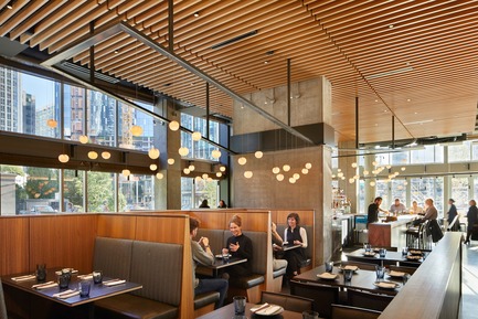 Press kit | 2886-02 - Press release | Wild Ginger Denny Triangle - SkB Architects - Commercial Interior Design - From the more private dining space looking through the bar.&nbsp; - Photo credit: Ben Benschneider