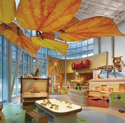 Press kit | 2073-09 - Press release | Discover the new Royal Alberta Museum - DIALOG - Institutional Architecture - The Children's Gallery is designed to feel like a tree fort within a forest. A metal panel perforated with Aspen leaf shapes wraps the gallery, and the mix of diagonal and straight support columns represent tree trunks. - Photo credit: Tom Arban Photography Inc